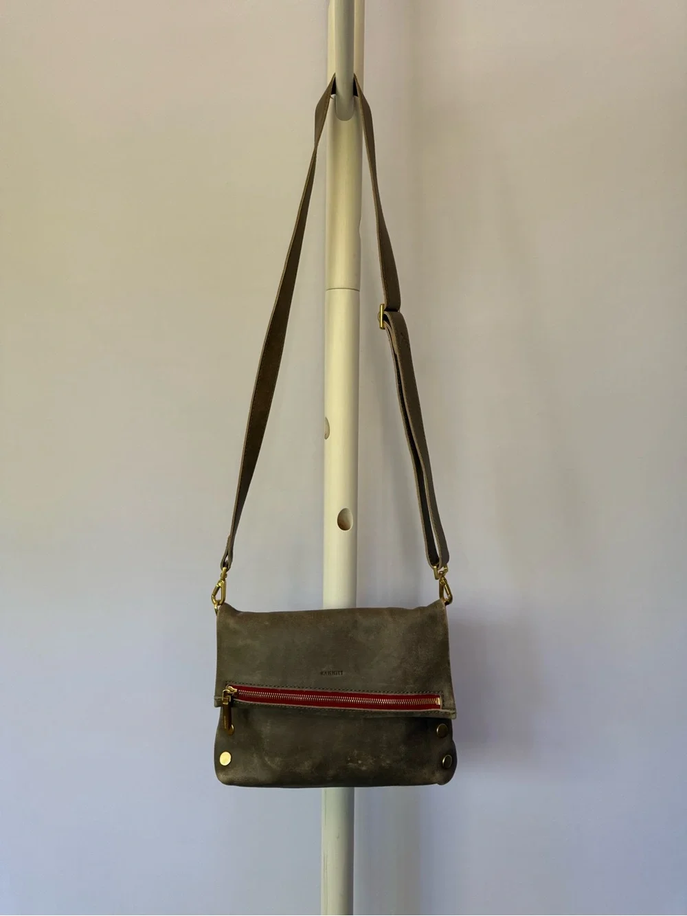 Weathered Grey Leather Crossbody Bag with Red Zip Detail
